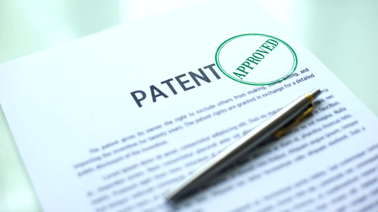 pen with paper that says patent