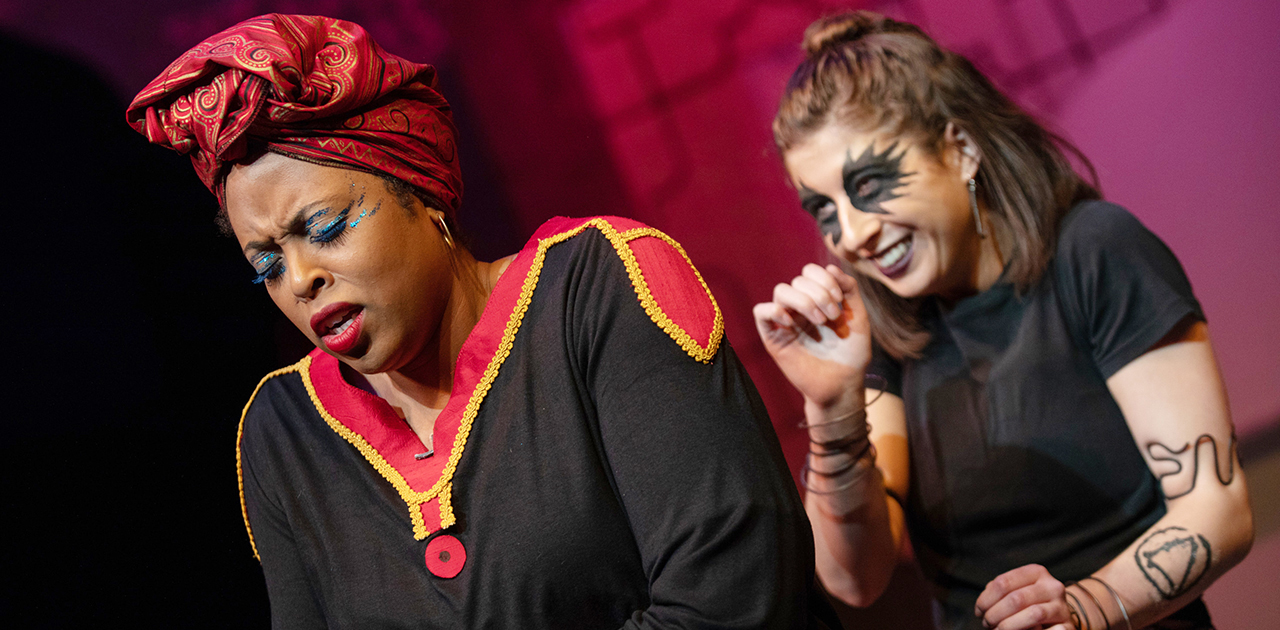Image of two actors in 2019 KU Theatre production of "Sycorax." Sycorax is a witch.