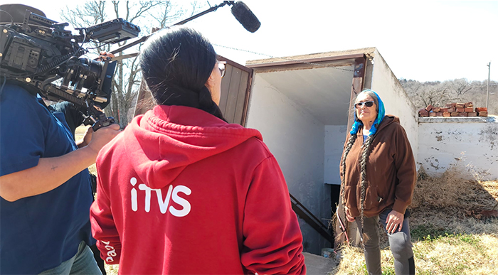 Rebekka Schlichting, center, interviews Deb Echo-Hawk, a member of the Pawnee Corn Seed Project for her documentary short film with Boots Kennedye, co-director and cinematographer.