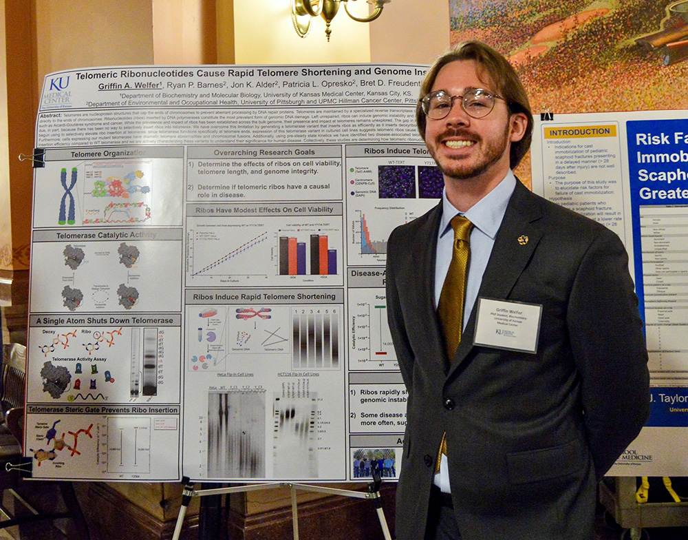 Griffin Welfer, KU doctoral student, with his research poster.