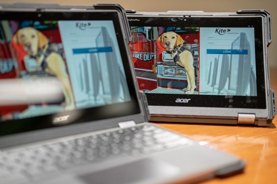 Two Chromebooks on a table showing the KFRTI Kite Suite tests
