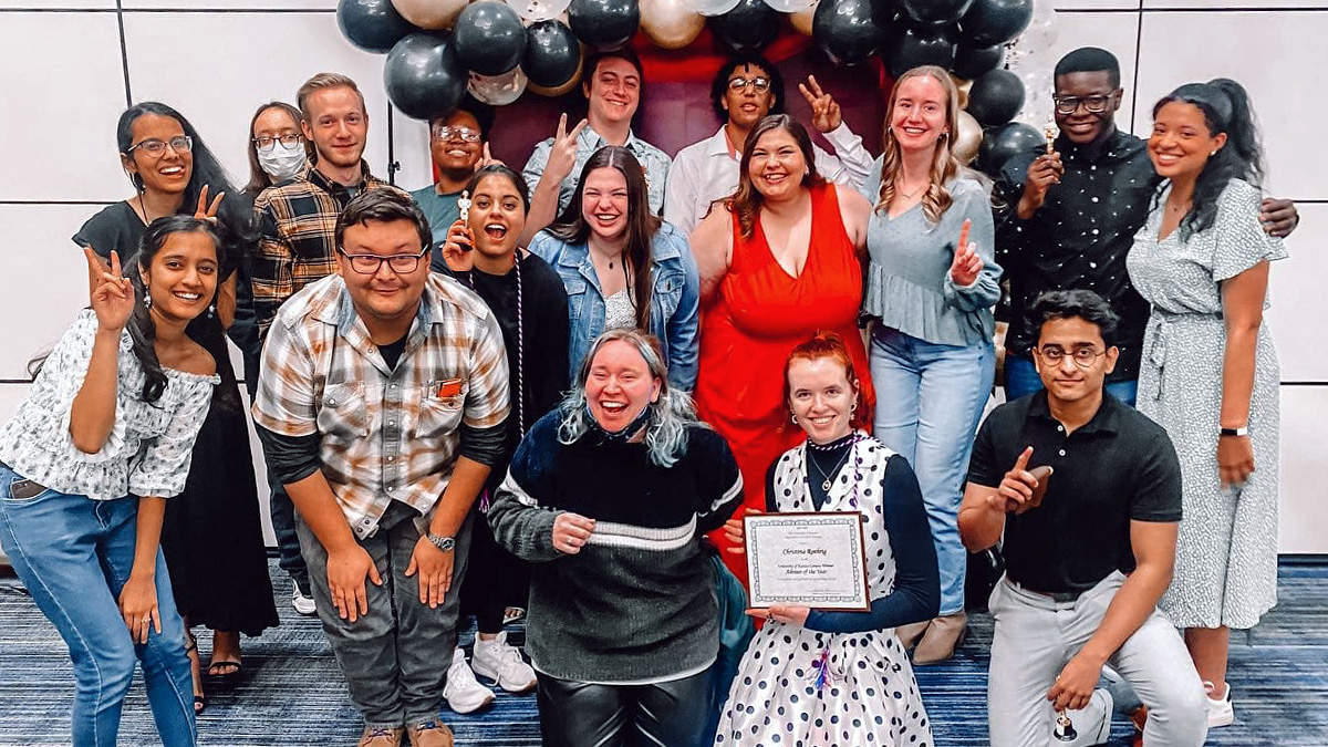 2022 Ellsworth Hall staff team smiling together for a group photo