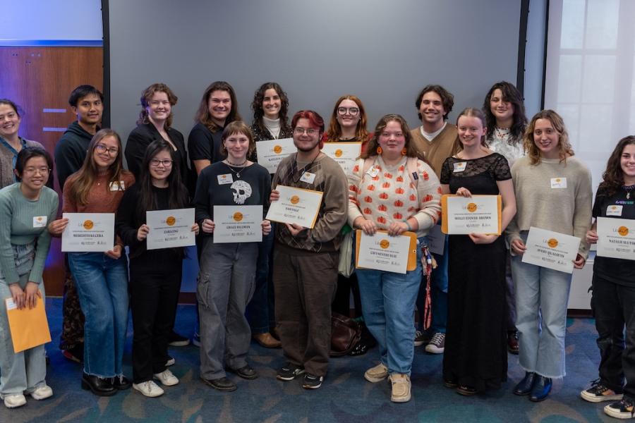 Award winners pose with their certificates at the 2025 LibArt Reception in Watson Library. Selected students from all majors have work exhibited inside the libraries’ public spaces during the annual showcase