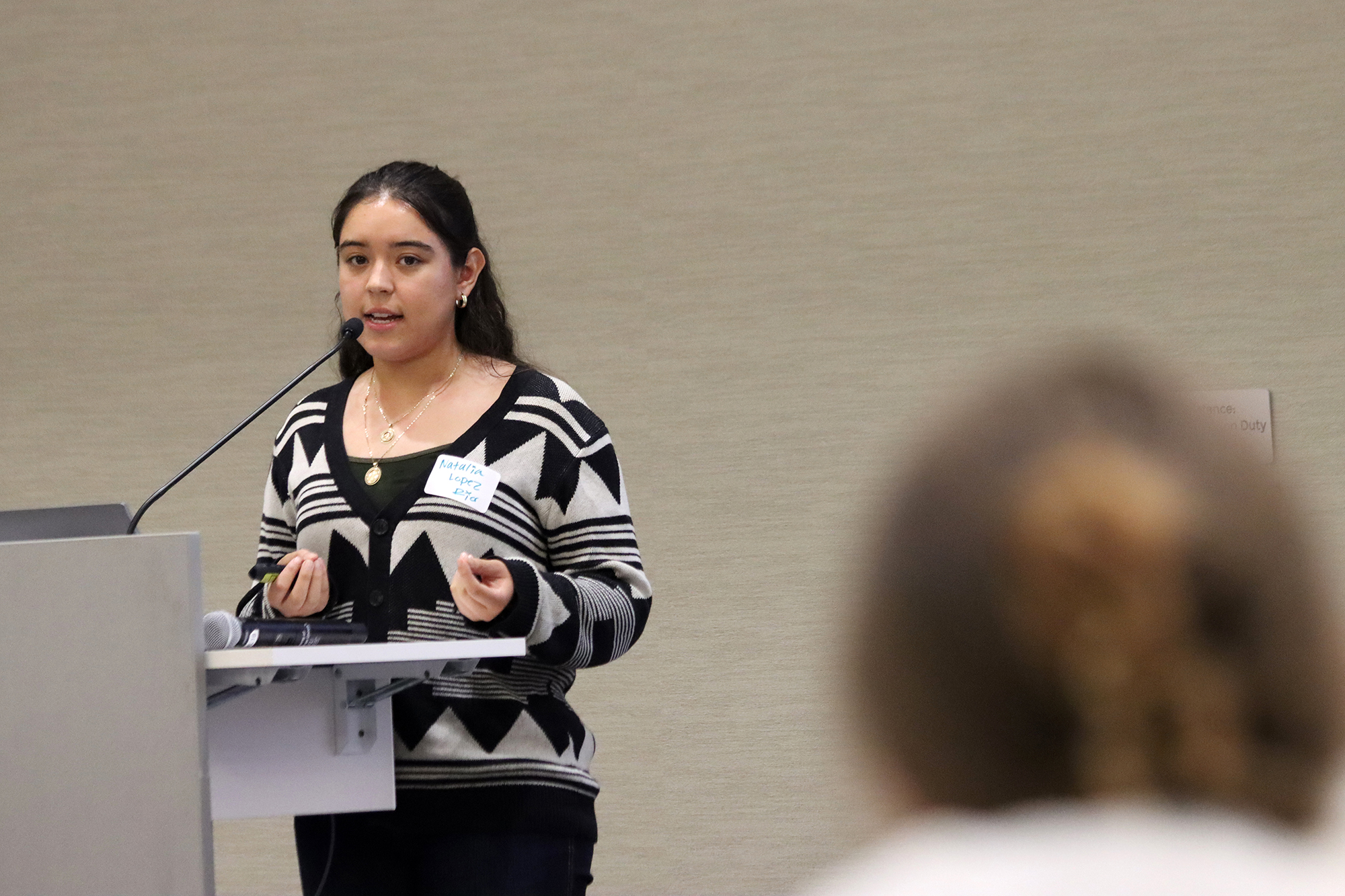 Natalia Lopez-Rios presents her original research at the 2025 McNair Scholars Summer Research Symposium. 