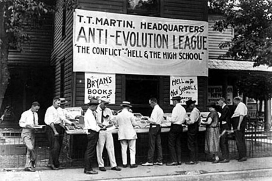 Individuals gather under banner for Anti-Evolution League at the Scopes Trial, Dayton Tennessee. Source: Literary Digest, July 25, 1925, via WikiCommons.
