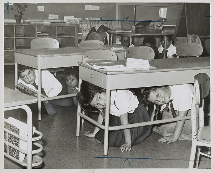 Walter Albertin, Wikimedia Commons. Students take part in a "duck and cover" drill in a Brooklyn school, circa 1962.