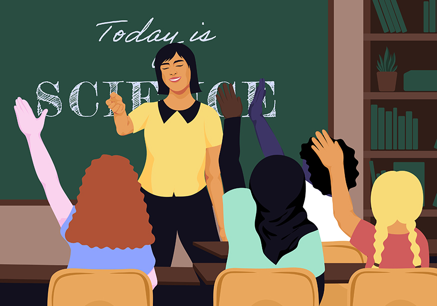 A teacher stands at the front of a room while students listen and raise their hands to speak