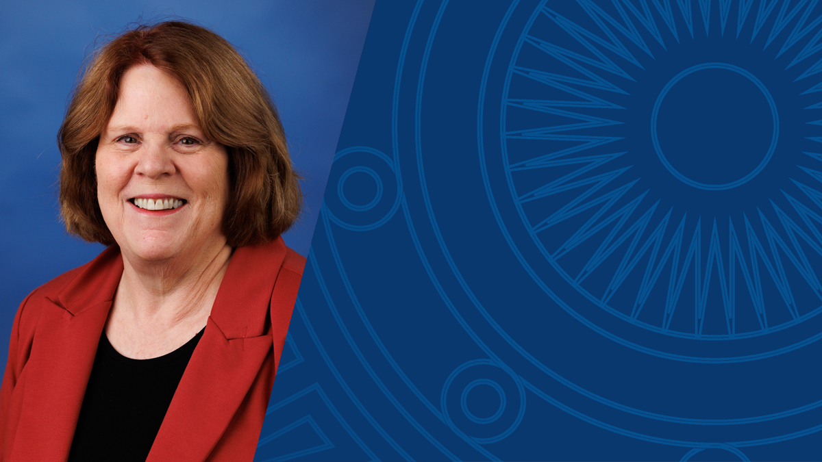 Portrait of Robin Lehman, director of faculty recognition & awards, next to a dark blue geometric background.