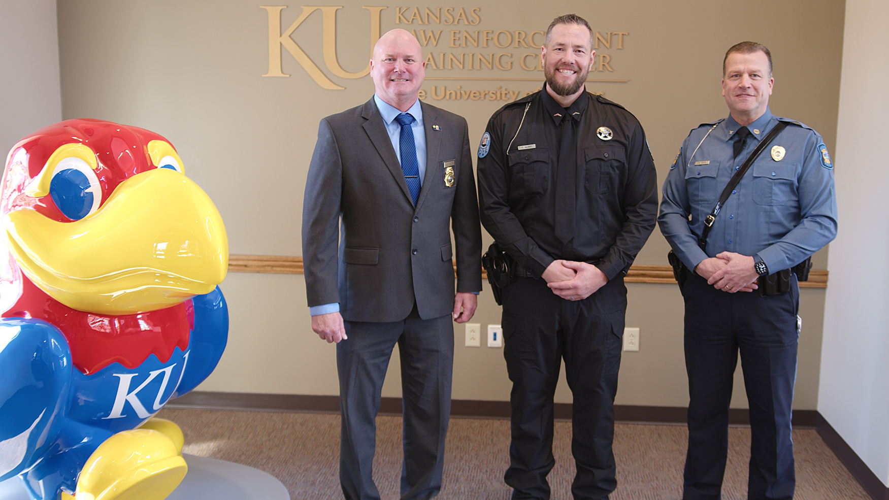 KLETC Director of Programs Doug Schroeder, Class President Frederick Klodt and Col. Erik Smith, superintendent of the Kansas Highway Patrol.