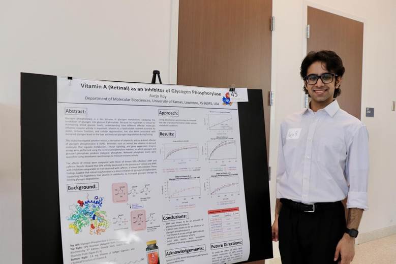 Aarjo Roy with poster
