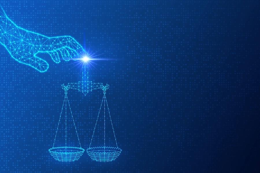 An ethereal computerized hand touches two scales that represent justice and morality. Image credit: Adobe Stock