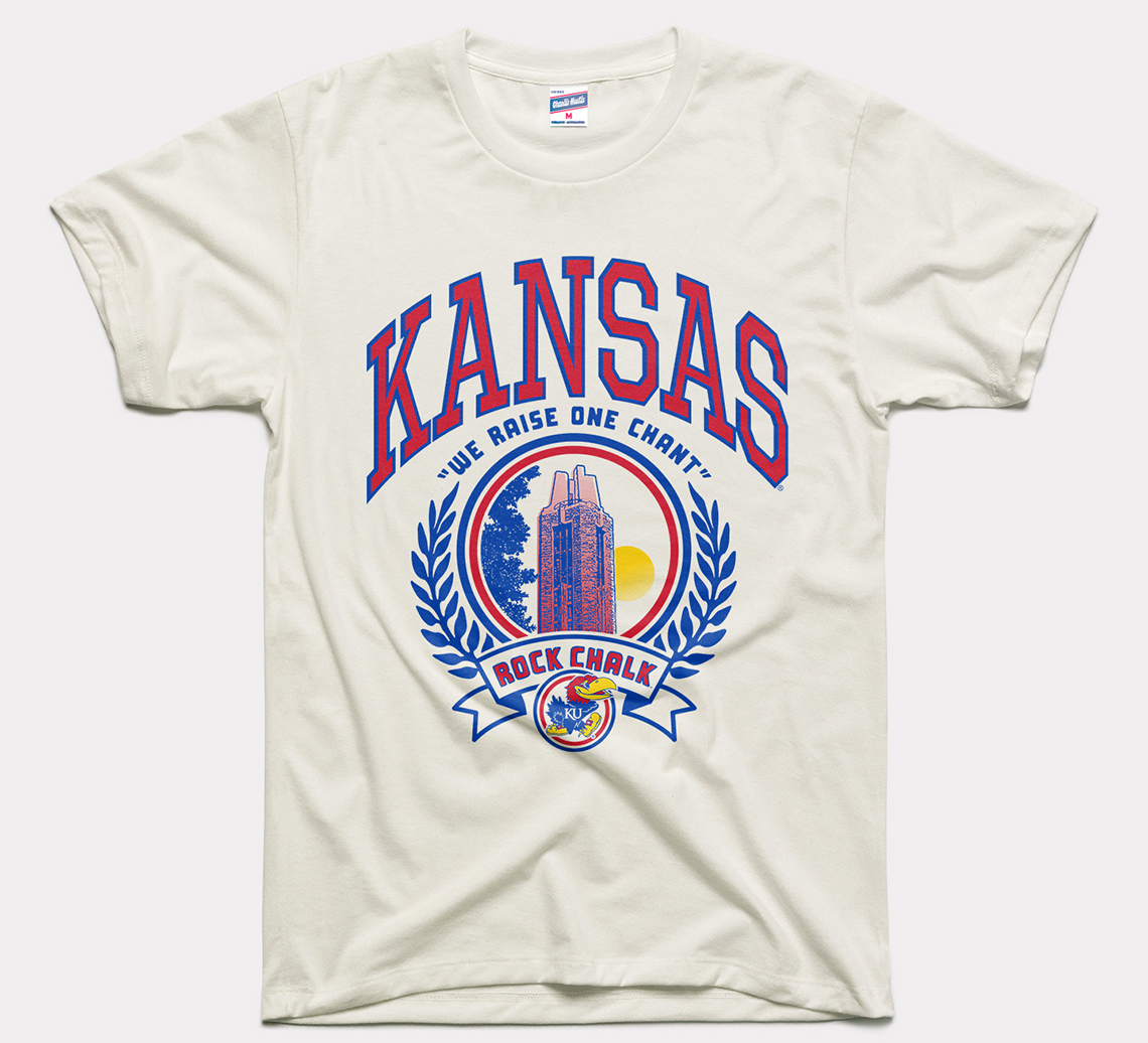 White T-shirt that says rock chalk and we raise one chant