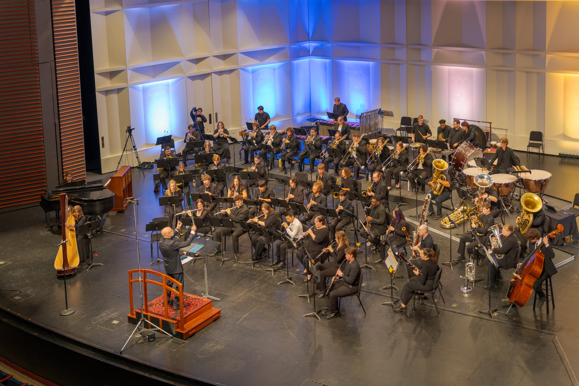 A group of musicians playing onstage.