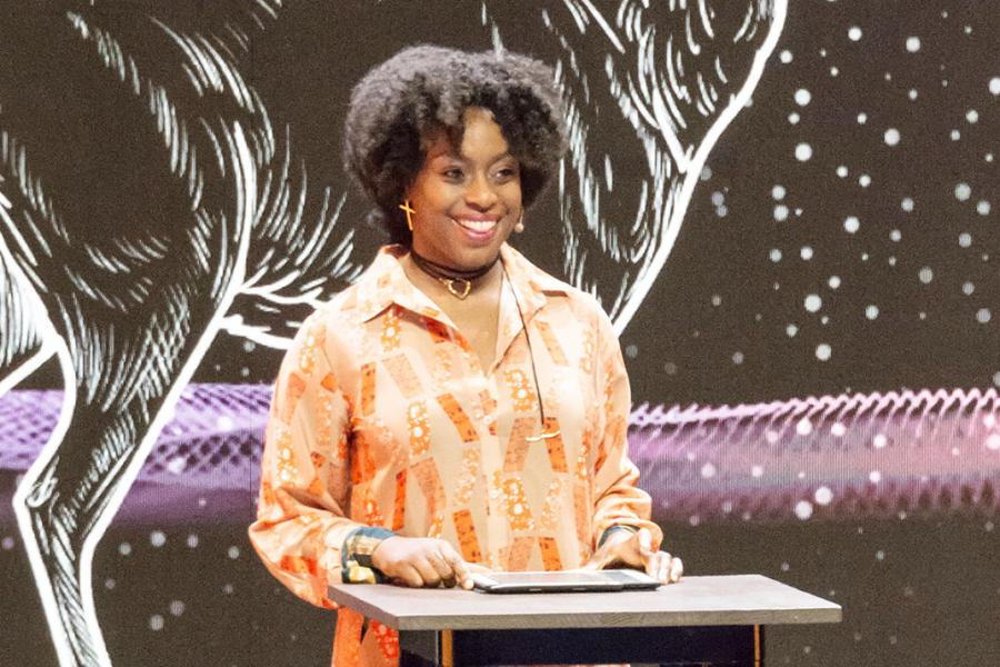 Woman standing at lectern