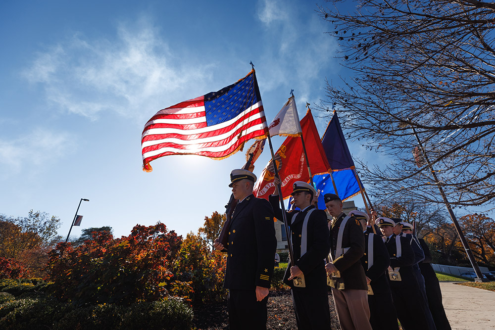 KU ROTC students stand guard at various war memorials on Memorial Drive to commemorate Veterans Day, 2021. A ceremony was held at the Campanile at 11:11 a.m.