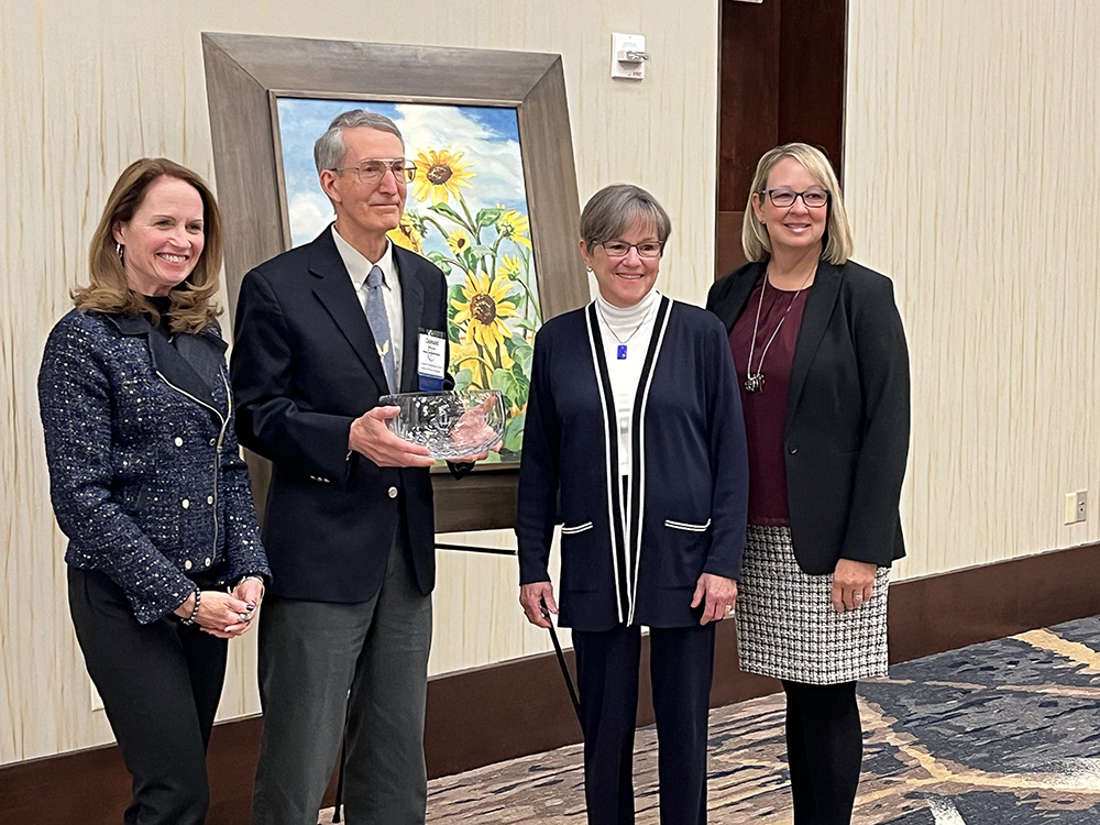 Photo: Connie Owen, director of the Kansas Water Office; Don Whittemore; Kansas Governor Laura Kelly; and Dawn Buehler, chair of the Kansas Water Authority.