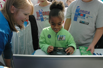 A child at a remote flight sim