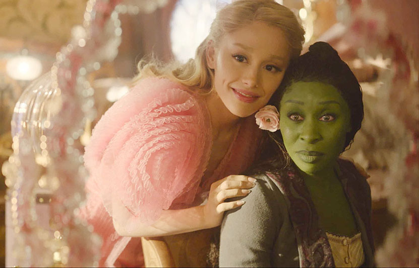 Actresses Ariana Grande and Cynthia Erivo shown as the characters Glinda and Elphaba in a still from the new film.