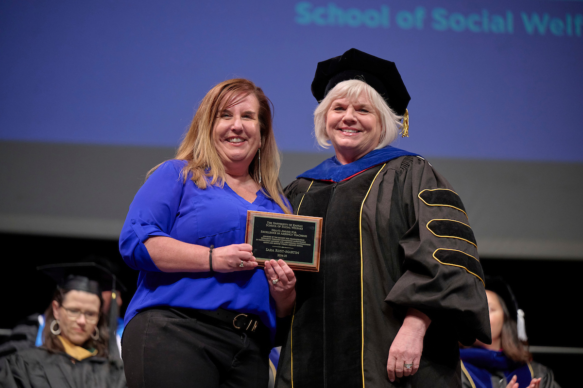 Sara Rust receives award from Social Welfare Dean Michelle Carney