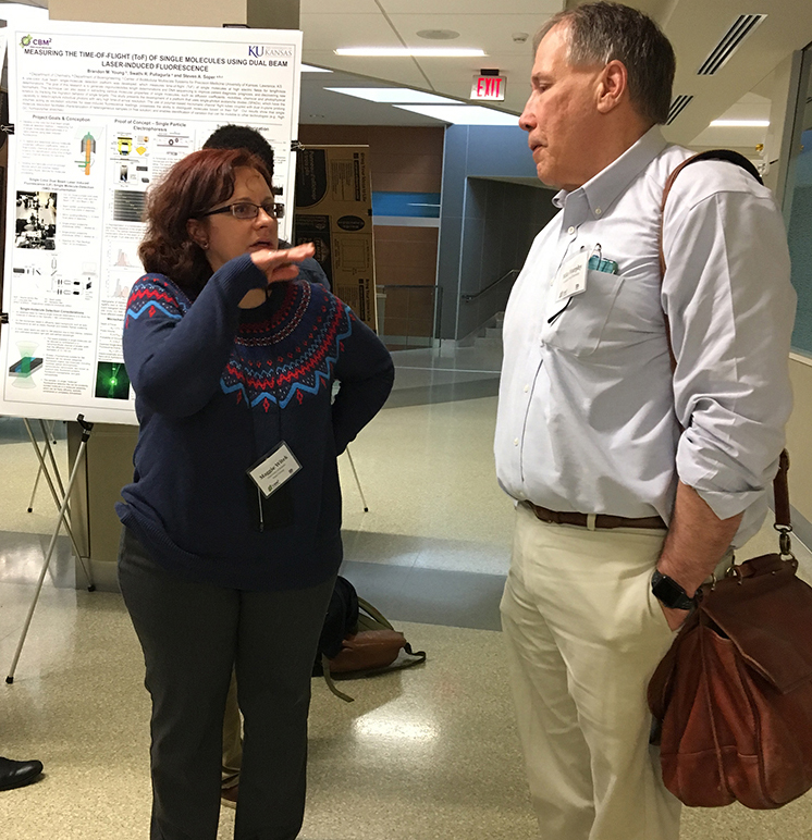 Two people engaged in discussion.