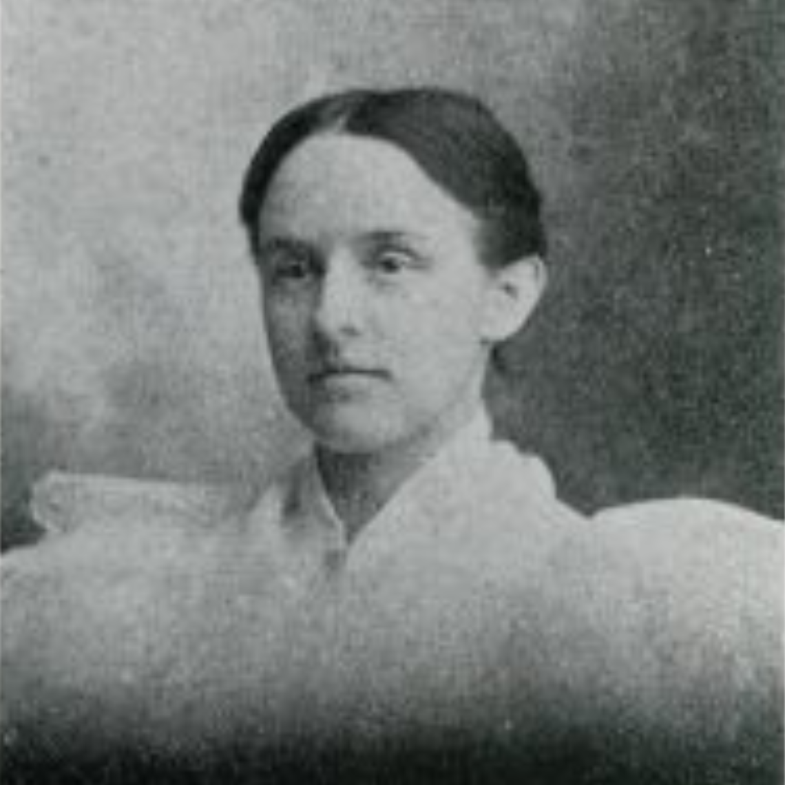 Portrait of Katherine Merrill as a young women wearing a white dress.