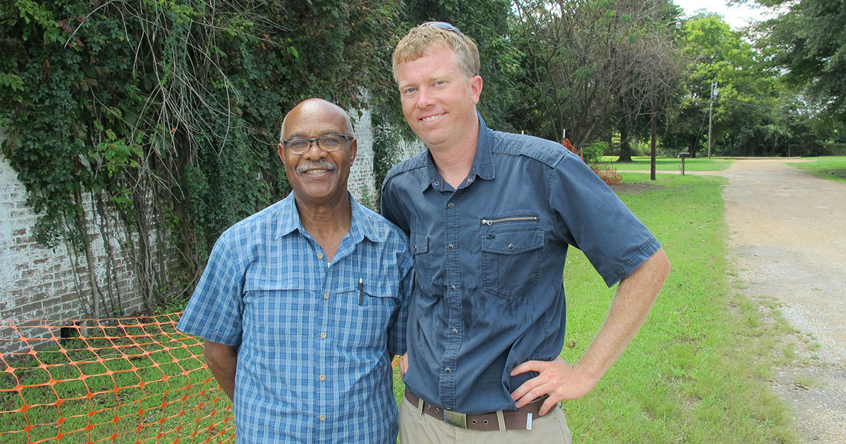 Dave Tell (right) with the late Simeon Wright in front of the former Bryant’s Grocery in Money, Mississippi, in August 2014. Wright, who died in 2017, was Emmett Till’s cousin and was an eyewitness to tevents at the store. Credit: Courtesy of Dave Tell.