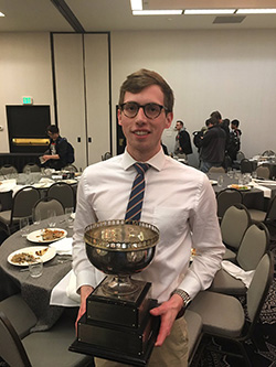 Jacob Hegna holding trophy