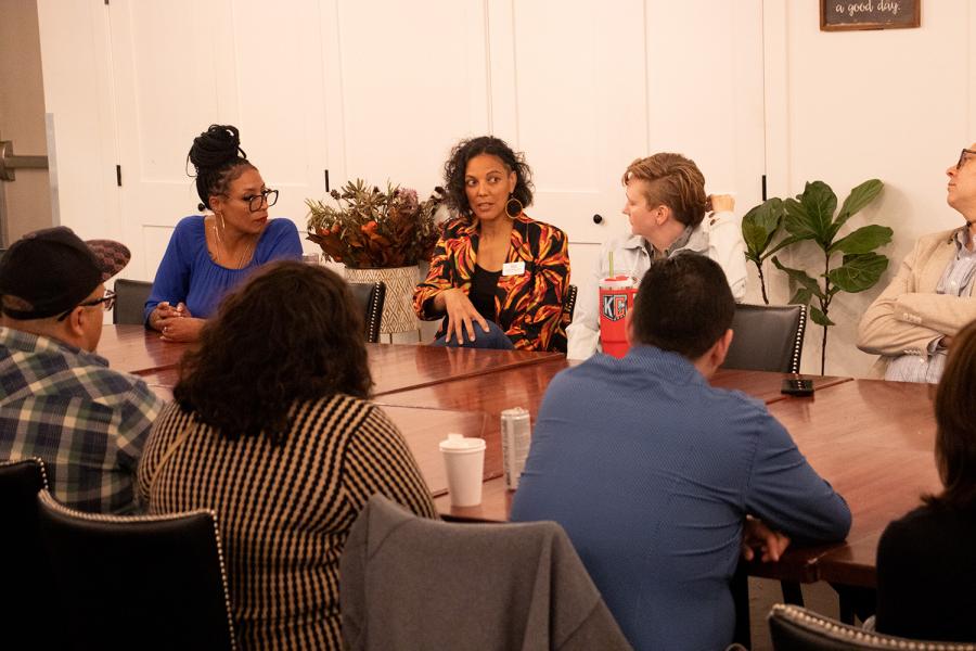 School of Social Welfare alumni Marqueia Watson, Sarah Owsley and Ashley Vernon in the cafeteria of KC Beehive in Kansas City in October, 2024.