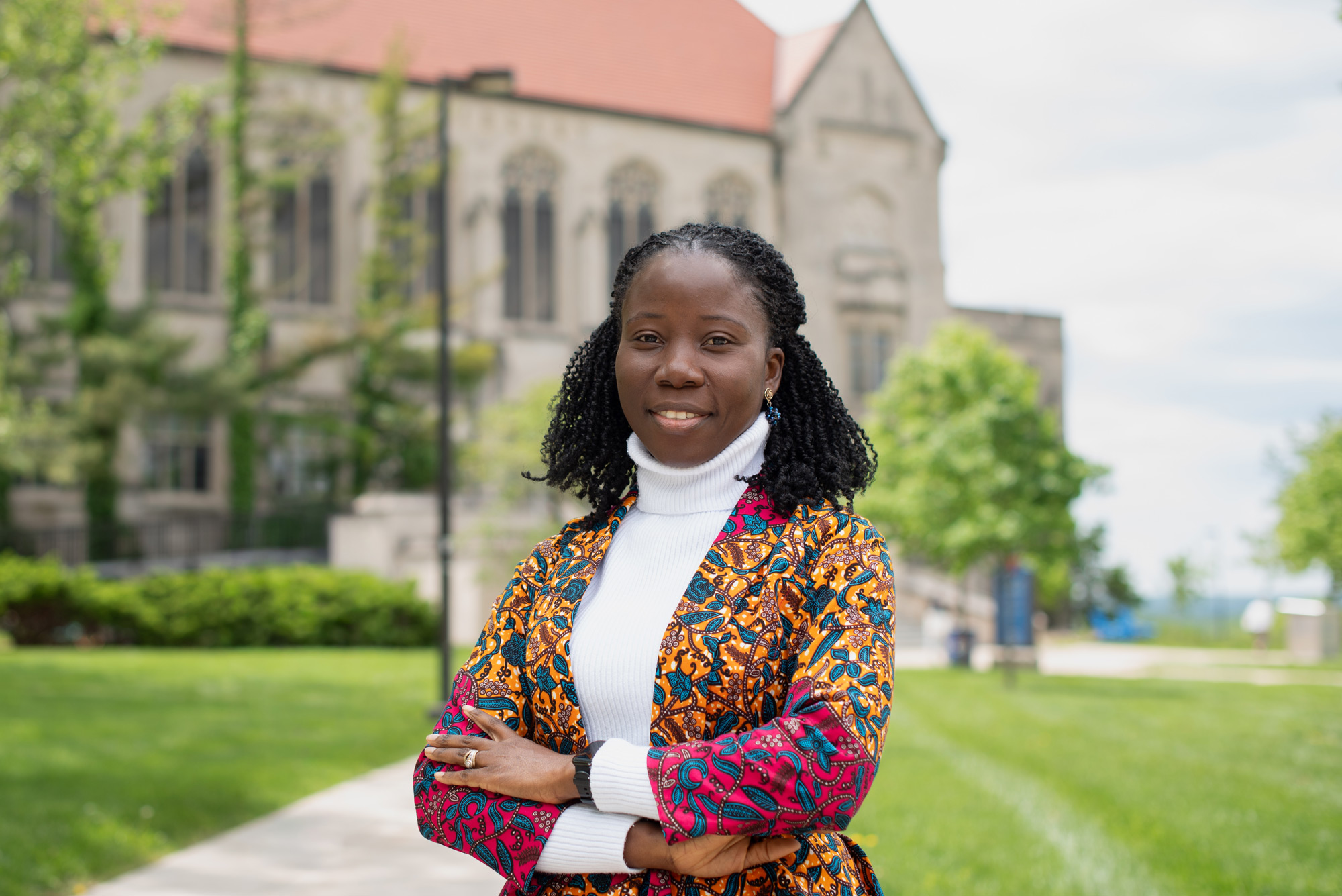 Patience Ocloo pictured standing in front of Watson Library.