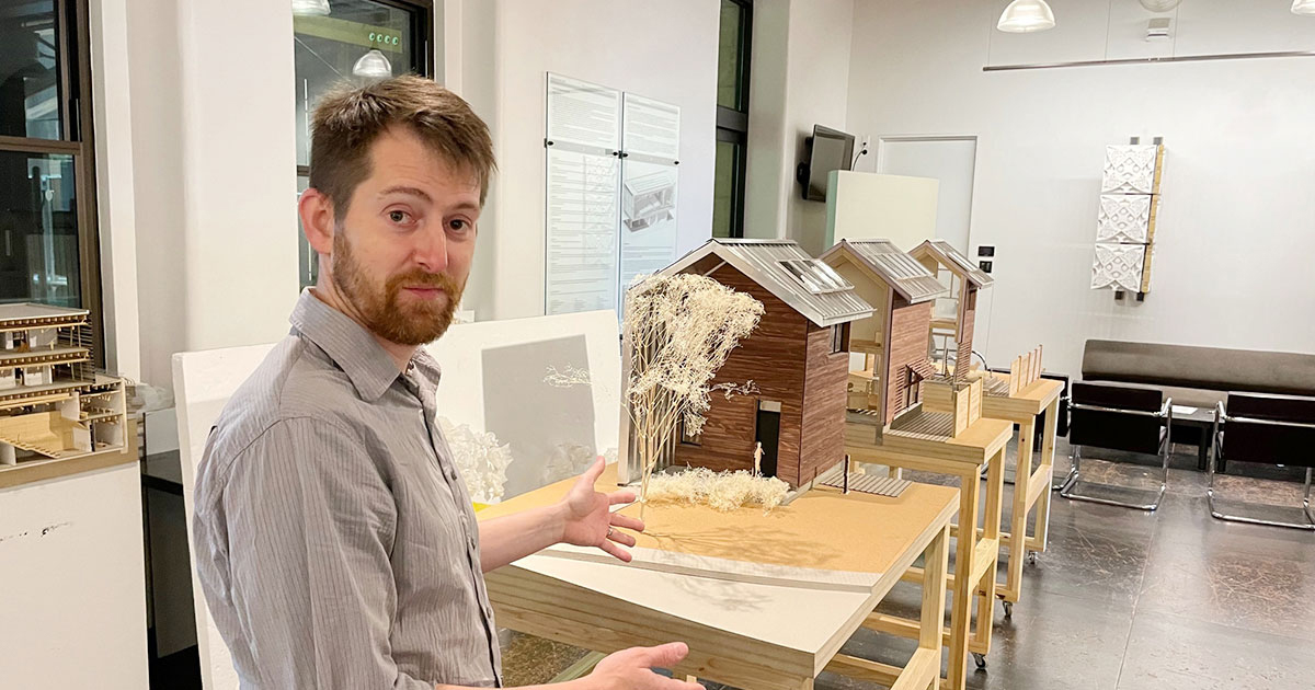 Chad Kraus with his Dirt Works Studio proposal for the Department of Energy.