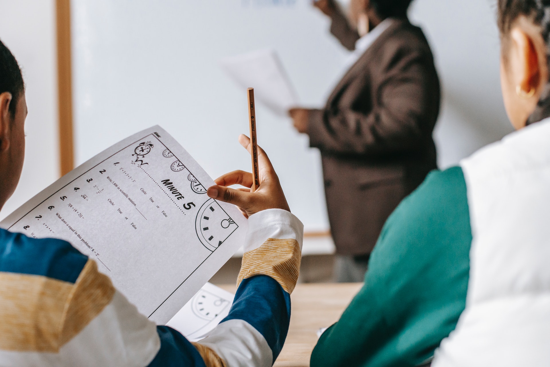 Teachers and student in class. Image: Pexels