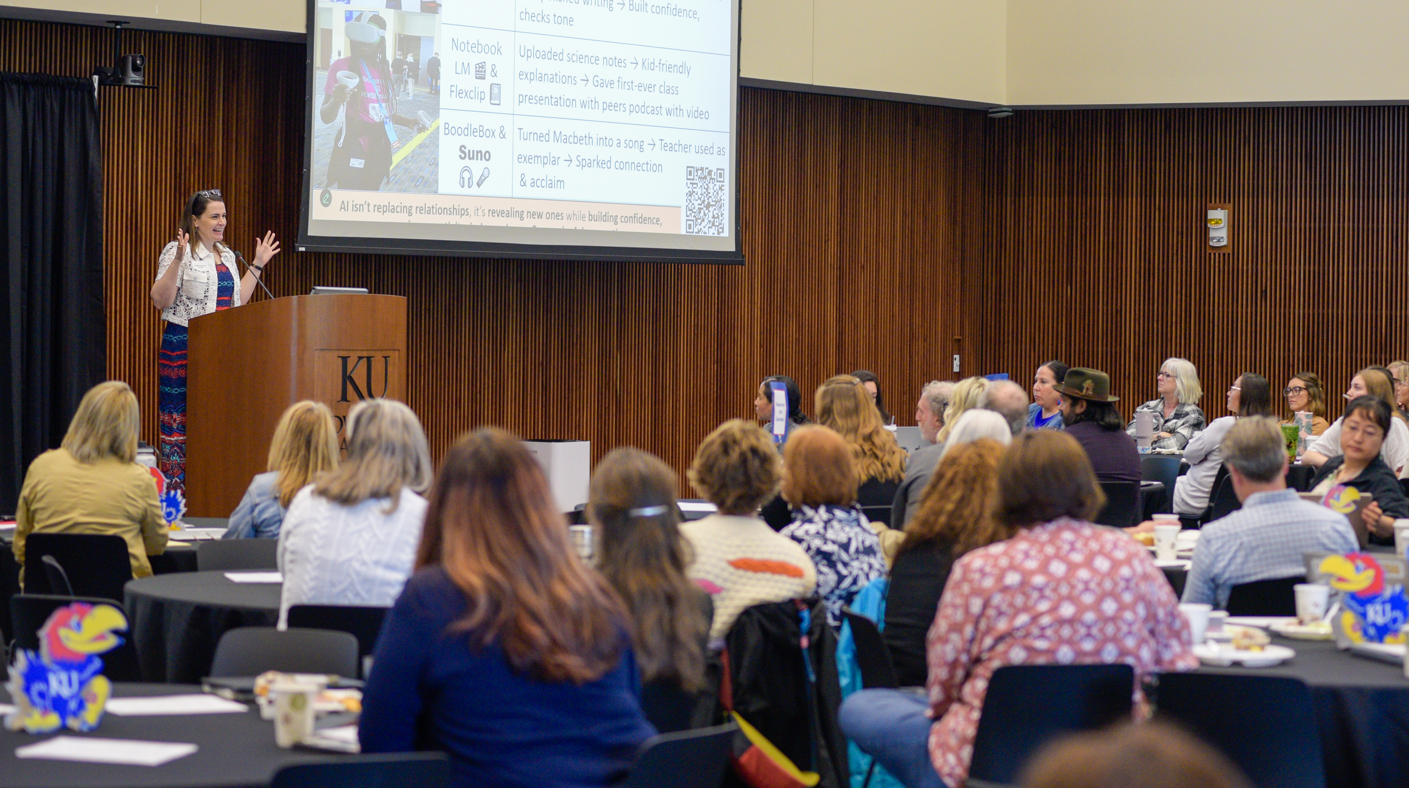 Maggie Mosher, assistant research professor with the Achievement & Assessment Institute, speaks to a crowd of teachers at this year's Strategies for Educational Improvement Summer Conference.