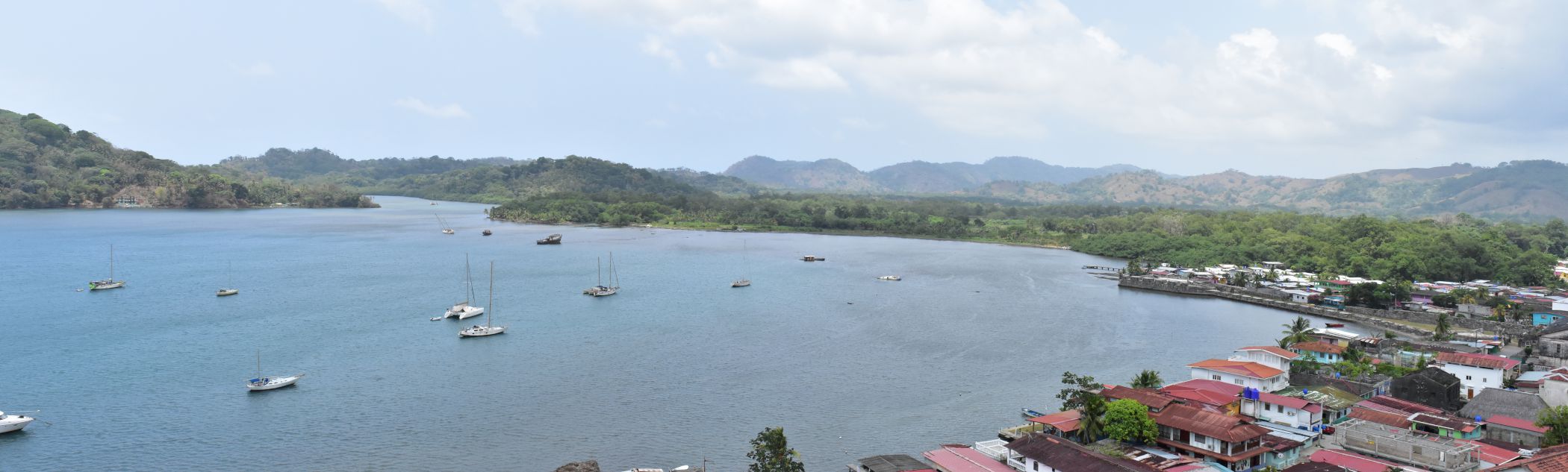 The bay of Portobelo, from the viewpoint of the 17th century Spanish fort (built by enslaved Africans) that looks upon hills housing the likely site of Santaigo del Príncipe, was the first community established by former maroons after their peace with the Spanish. Photo by Robert Schwaller.