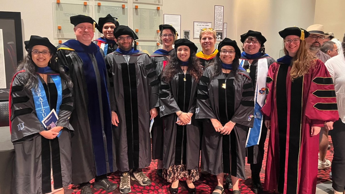 (Left to Right):  Vaishnavi Kulkarni, Dr. Erik Lundquist, Bryan Jimenez (in the back), Vedant Jain, Dr. Kristi Neufeld (back), Anika James, Dr. Erik Holmstrom (back), Samalee Banerjee, Gabby Perkins (back), Dr. Josie Chandler