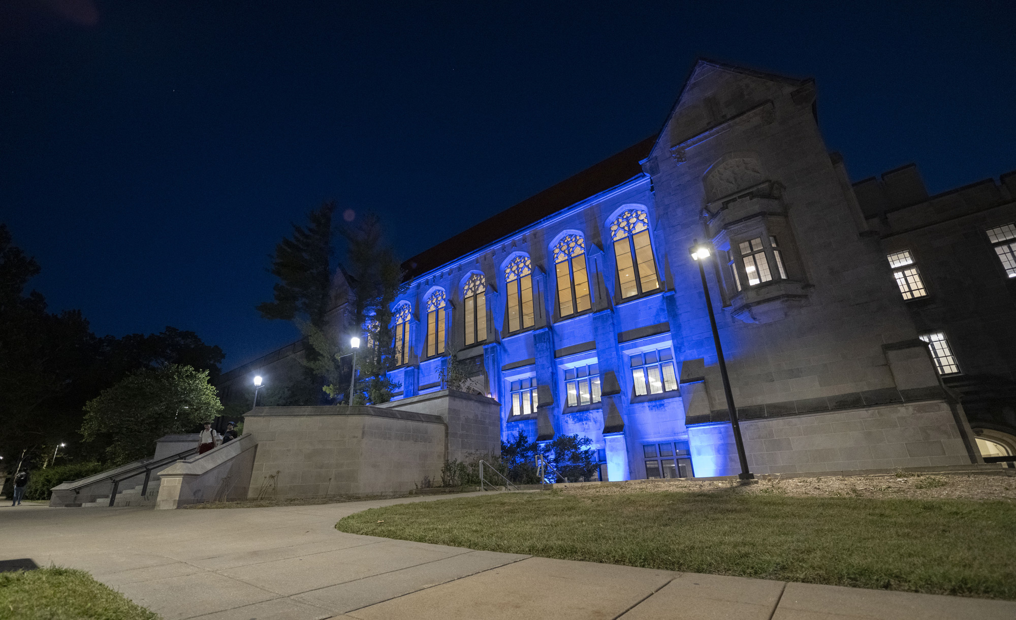 Watson Library with blue uplighting at night.