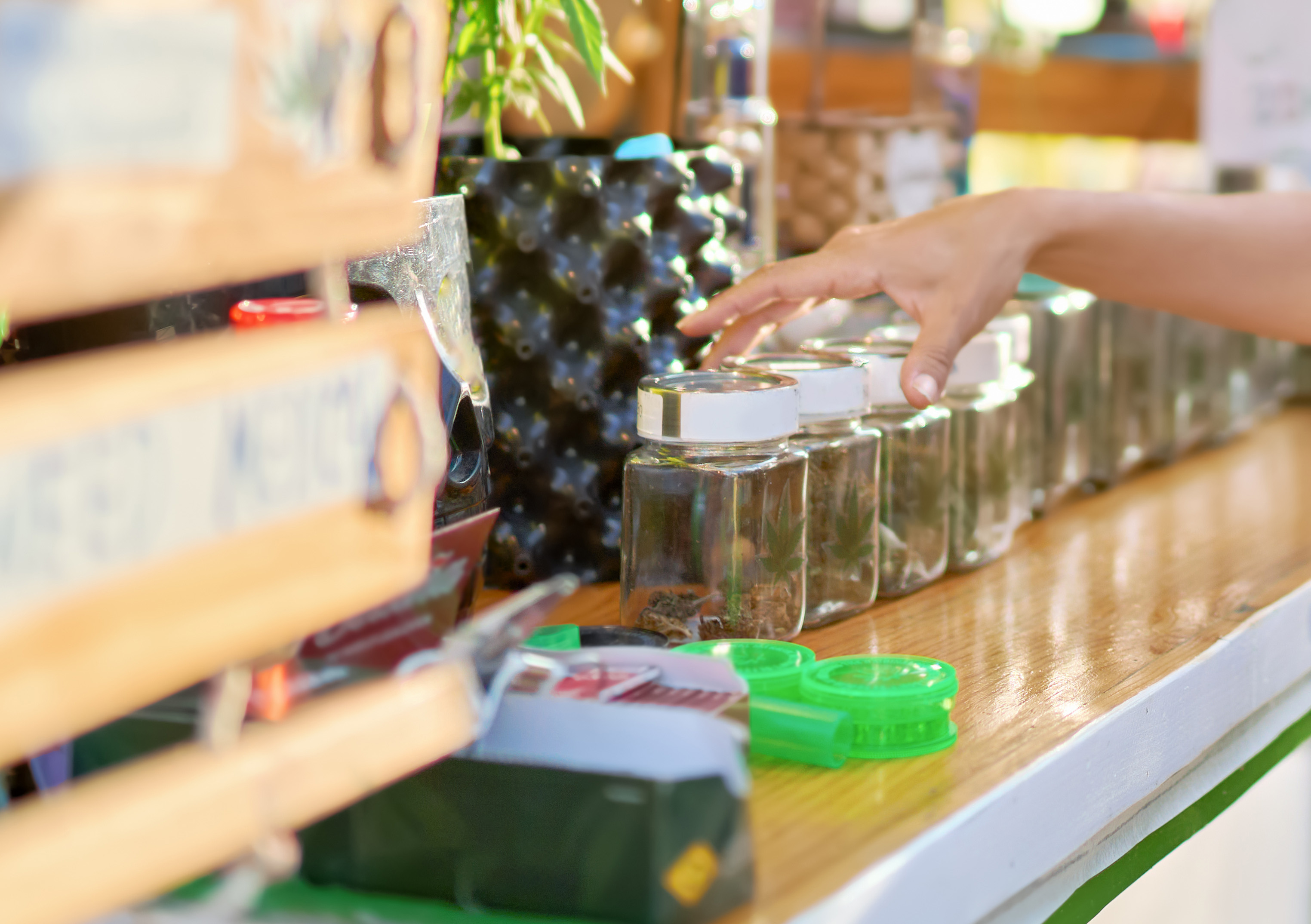A woman browses items for sale at a dispensary