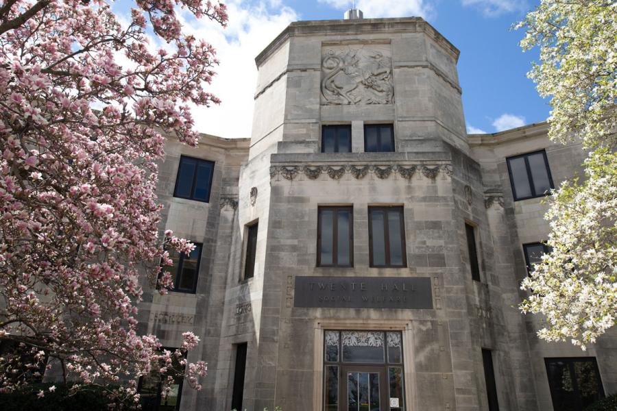 Twente Hall with spring flowers blooming in front of the building