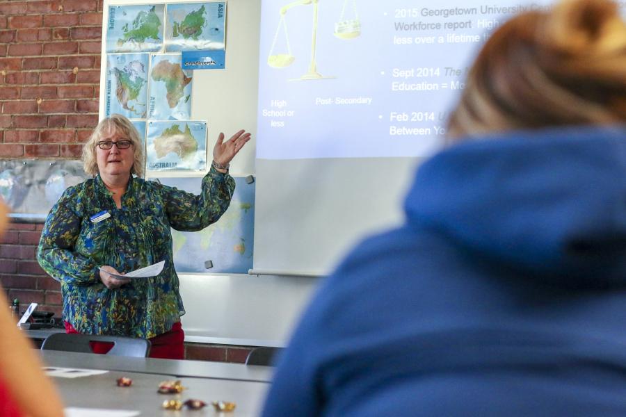 Melody Lawrence teaching in front of a class of students