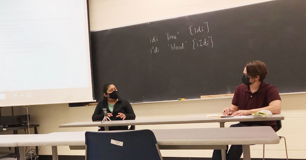 Eutropia Rodriguez (left) gives a guest lecture in Philip Duncan’s capstone typology class, teaching some words in Meꞌphaa.