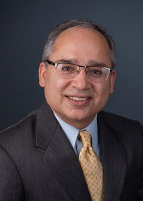 Dr. Tarun Sabarwal