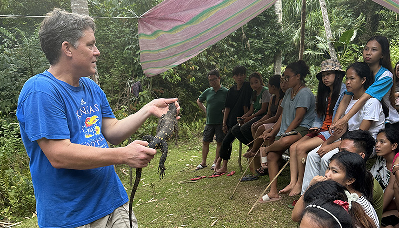 Rafe Brown, KU professor and curator, gives a presentation in the Philippines.
