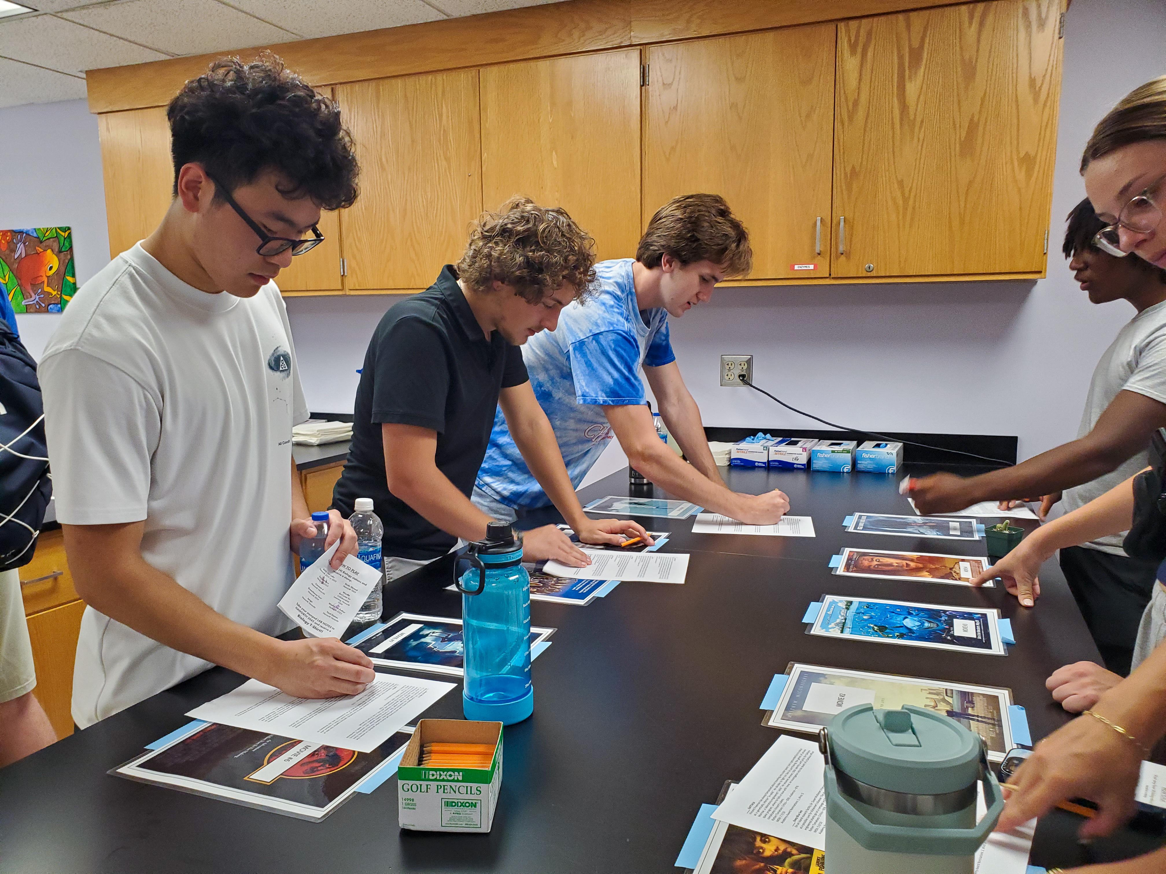 A group of students play Biology Movie Match