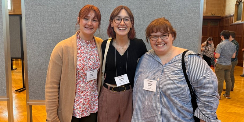 Lexie Cutter (left) with two conference participants