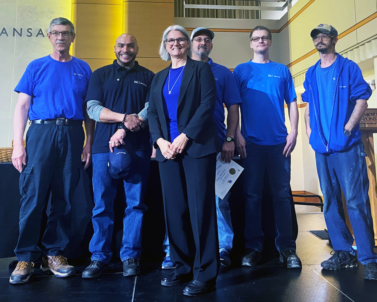 The Power Plant Team, named the 2025 Team of the Year, is pictured with Provost Barbara Bichelmeyer.