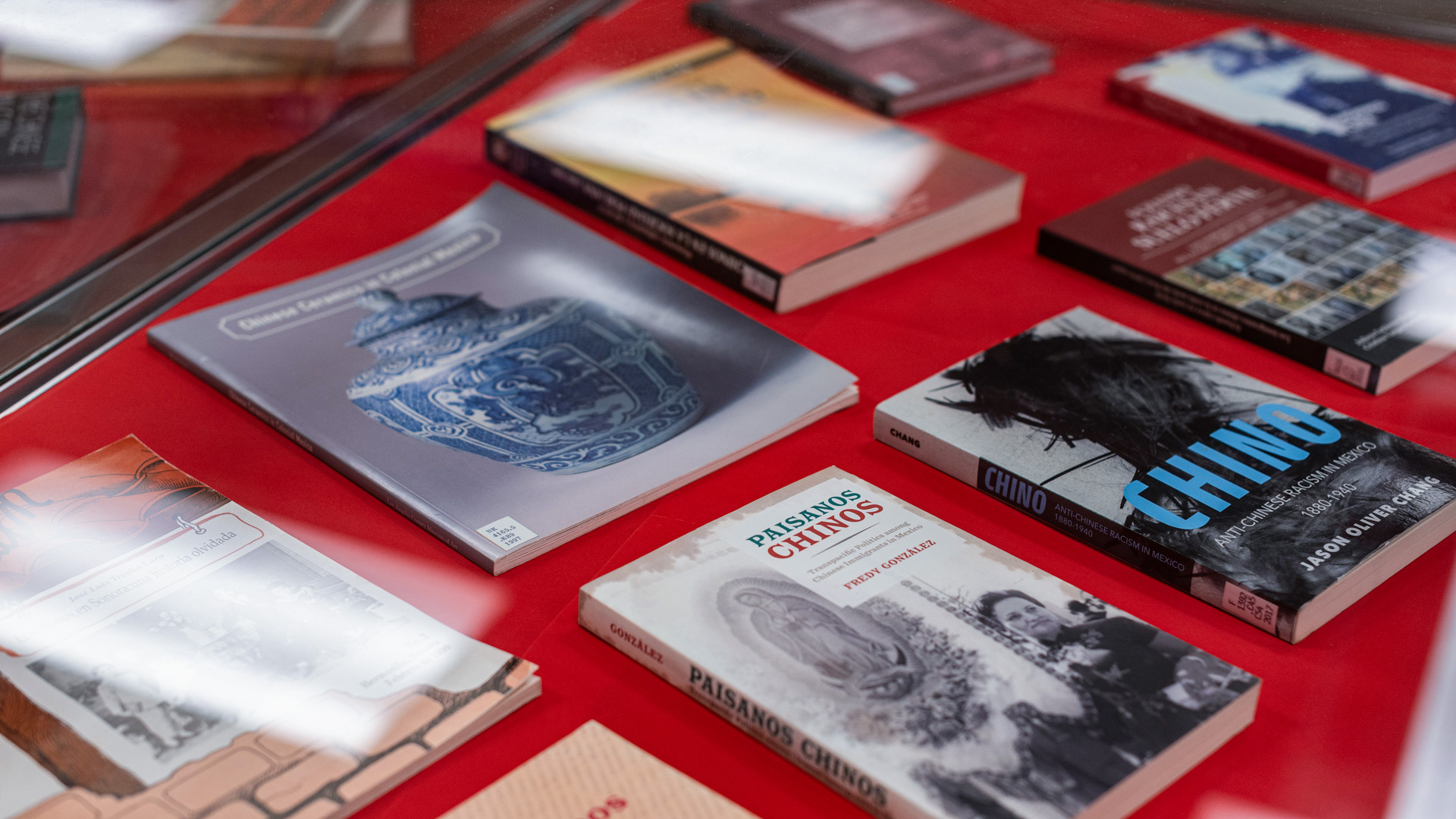 Books on display in a case.