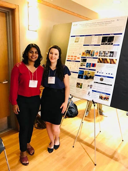 Graduate students Charuni Amarasekara and Eva Mohr at the ACS MWRM poster session.