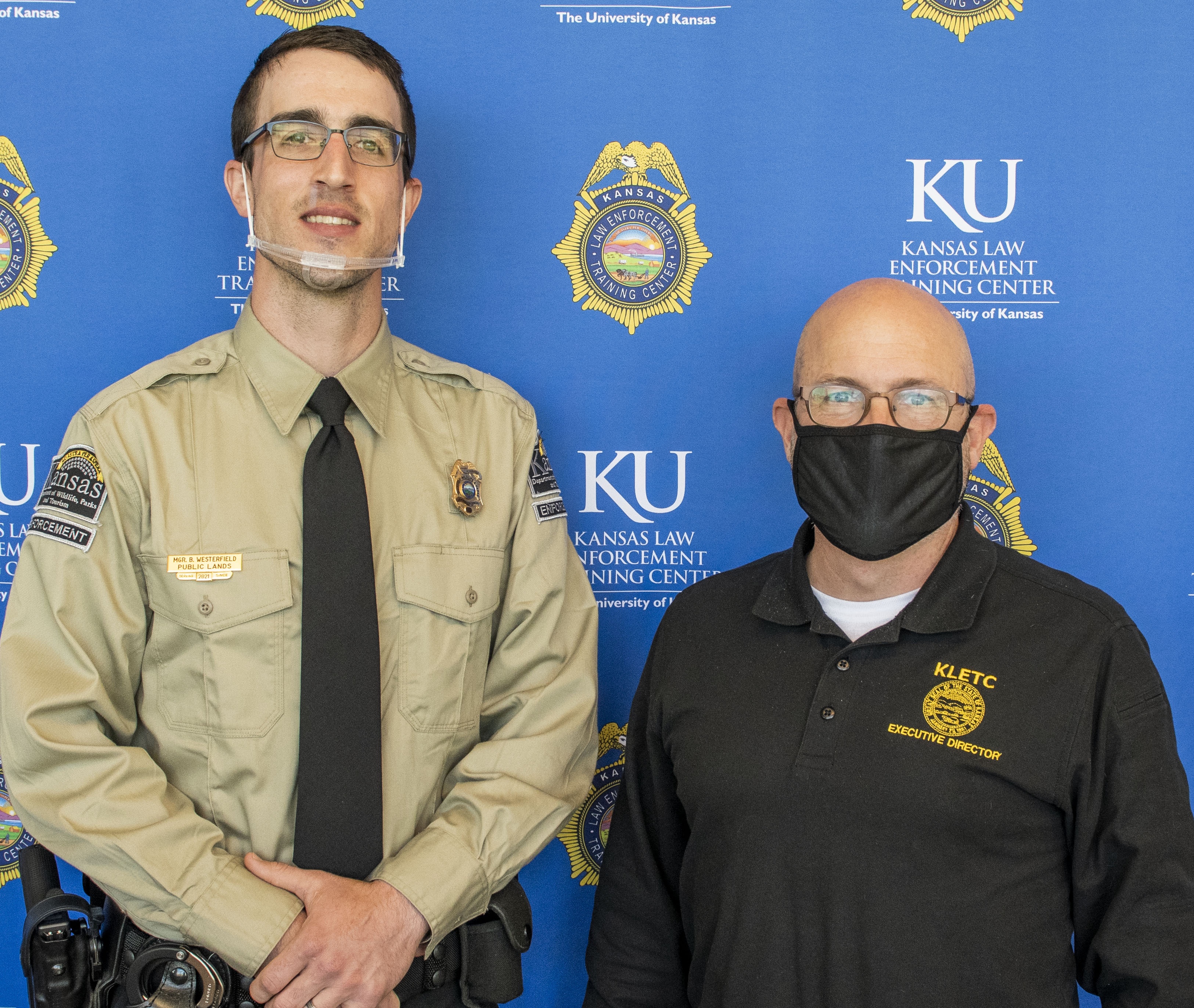 Class president for the 277th Officer Joshua Westerfield and KLETC Executive Director Darin Beck