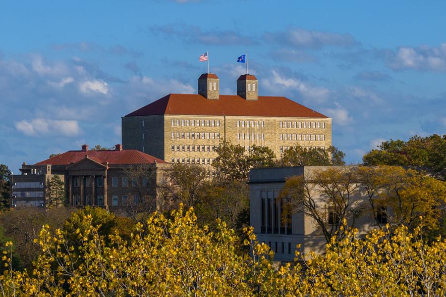 Fraser Hall with fall foliage in foreground.