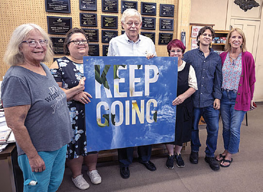 From left are Marion County Record staff members Phyllis Zorn, Cheri Bentz, EricMeyer, Deb Gruver and Nicholas Kimball with Kansas Society of Professional Journalists President Molly McMillin.