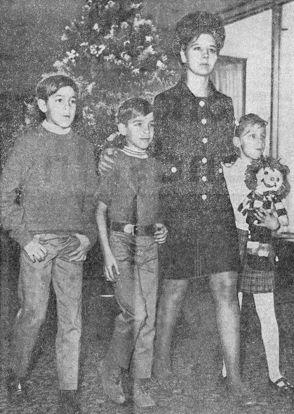 Kathleen Johnson and her three children, 1969. Credit: Dole Archives